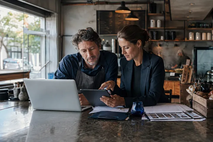 Local business owner and growth specialist planning a search campaign